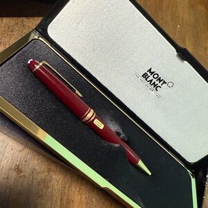 Mont Blanc Vintage Gold Text on Black Surface